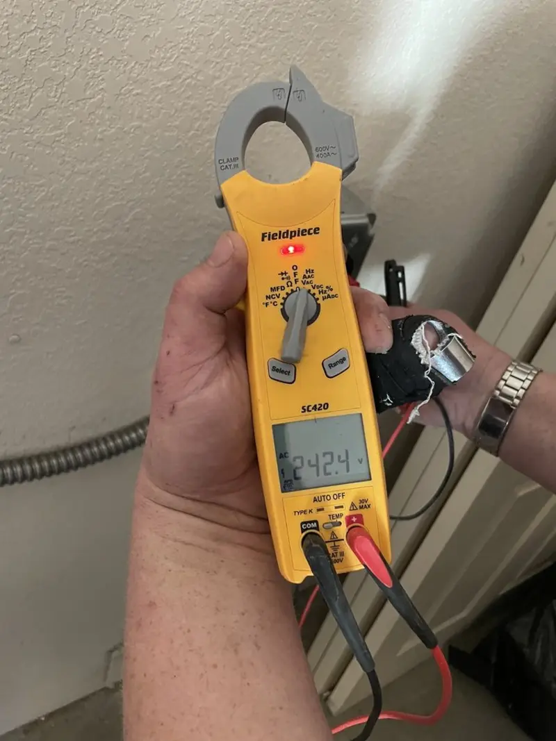 Voltage testing with clamp meter during Generator Installation in North Adams